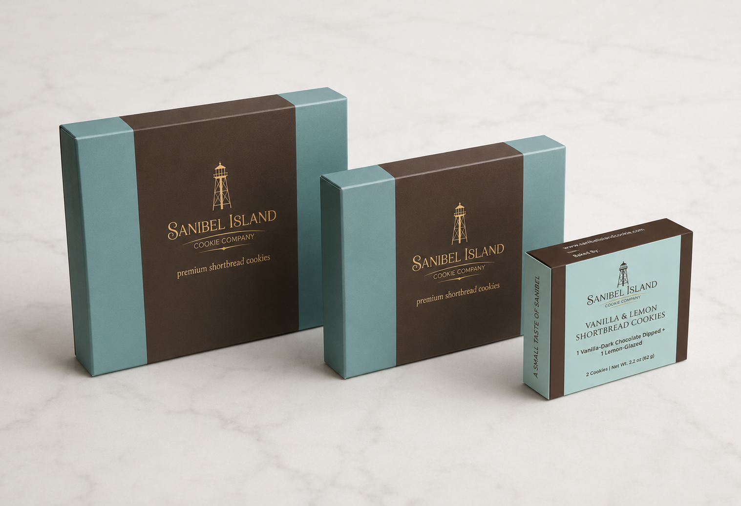 Large, medium, and small Sanibel Island Cookie Company gift boxes shown together